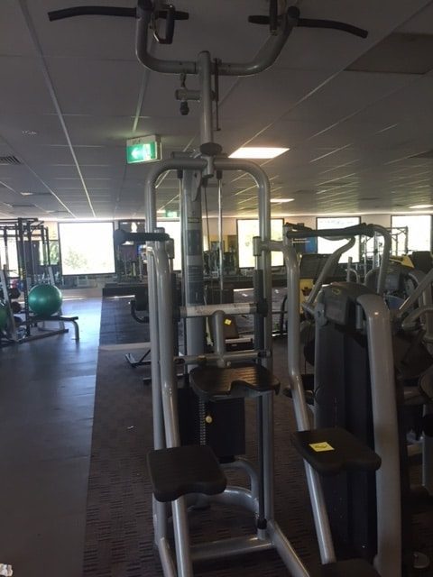 Technogym Selection Series Assisted Chin & Dip in a gym